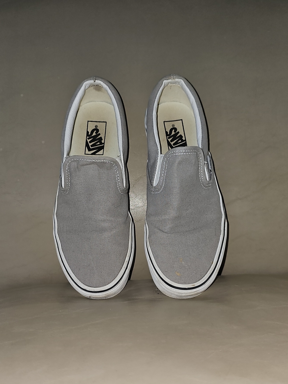 Vans Slip-On Canvas Sneakers in Light Gray